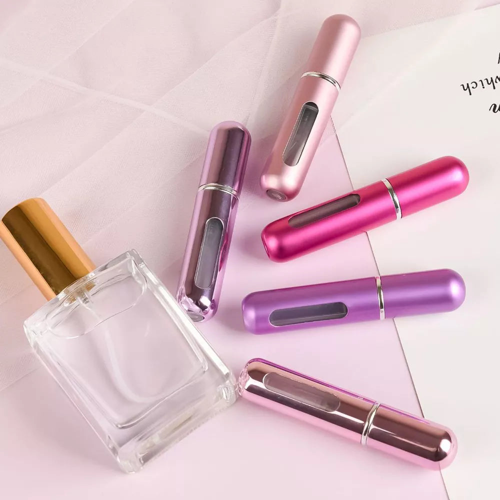 mini mist portable perfume atomiser that you can refil when needed with your own sent